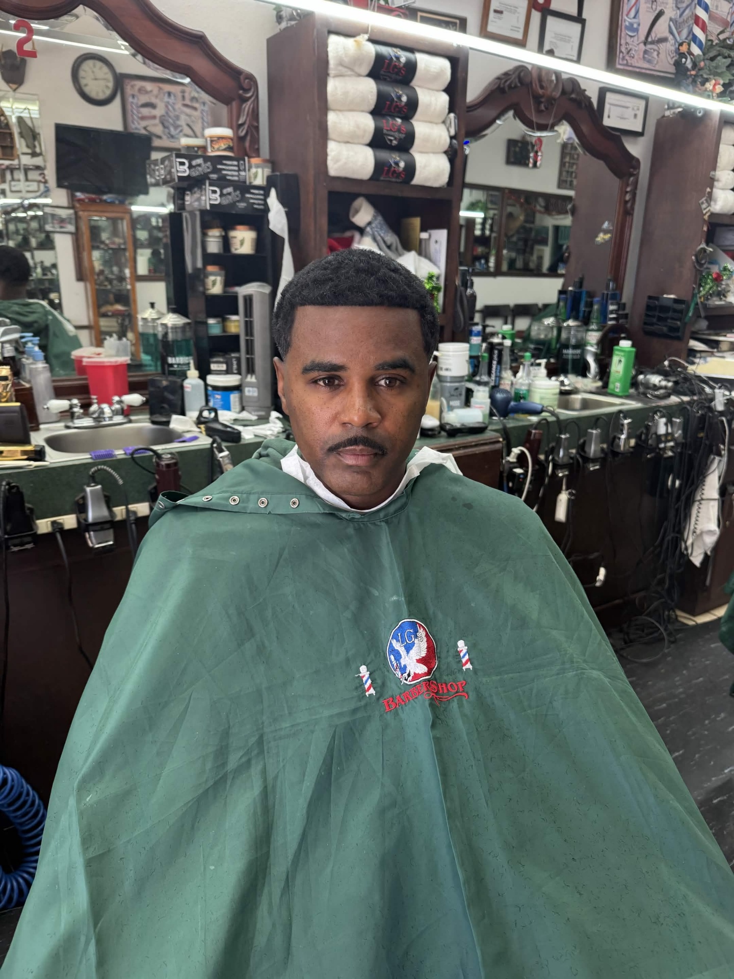 Clean tapered cut at LG's Barber Shop